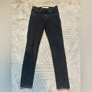 Girl- Levi’s black super skinny size 12